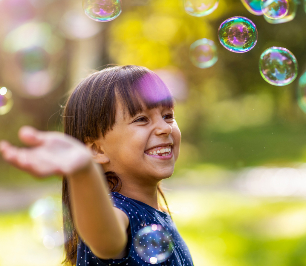 young girl with bubbles